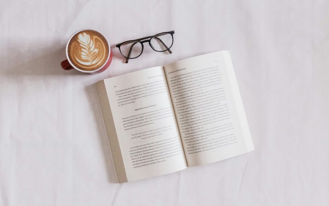 Dr. Neruda’s Cure for Evil book with coffee and glasses