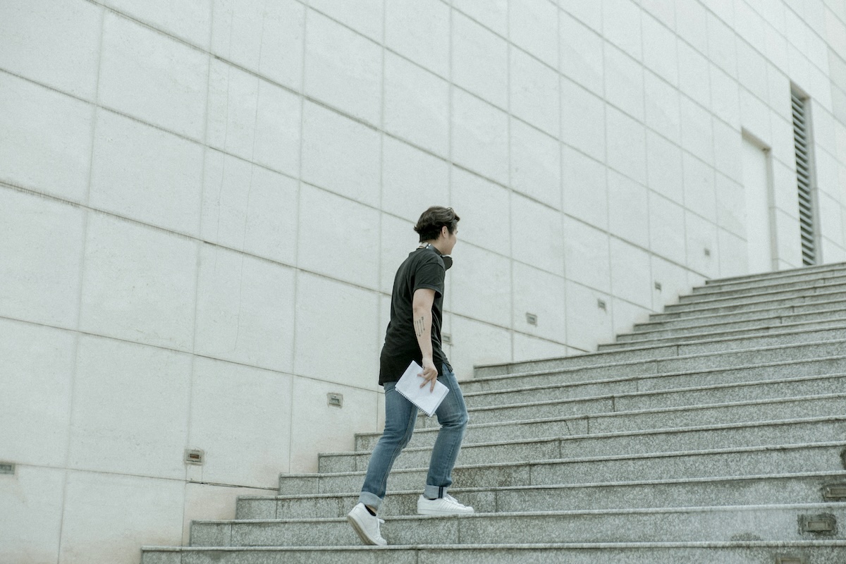 Stone steps ascending upward, symbolizing gradual progress and personal growth in therapy