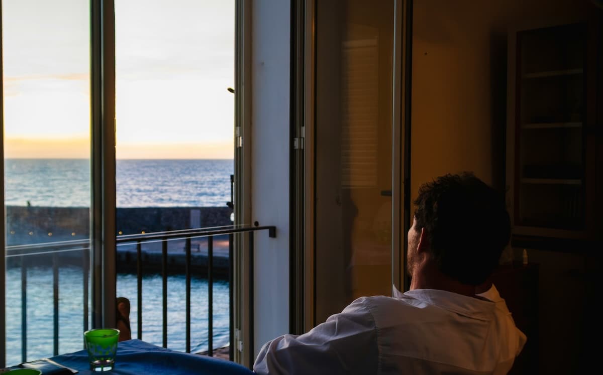 Man reflecting quietly, representing emotional suppression in men