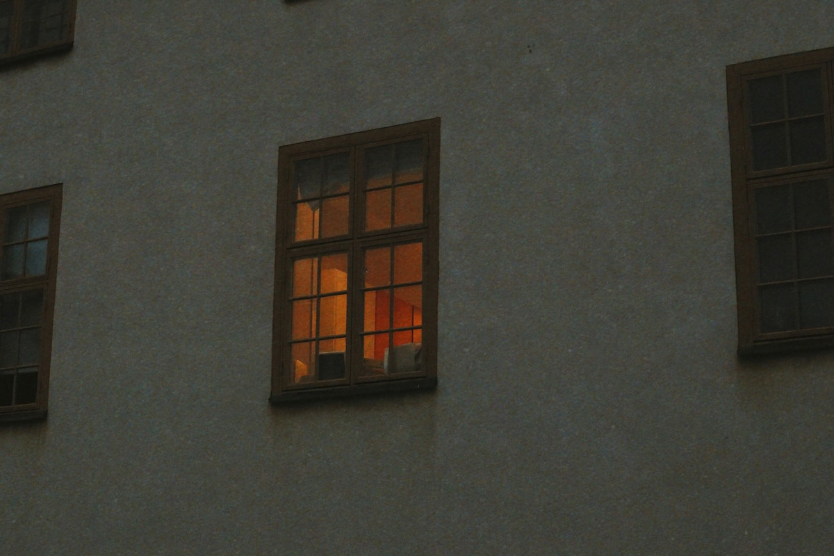 Warm light through a window symbolizing reflection and emotional insight