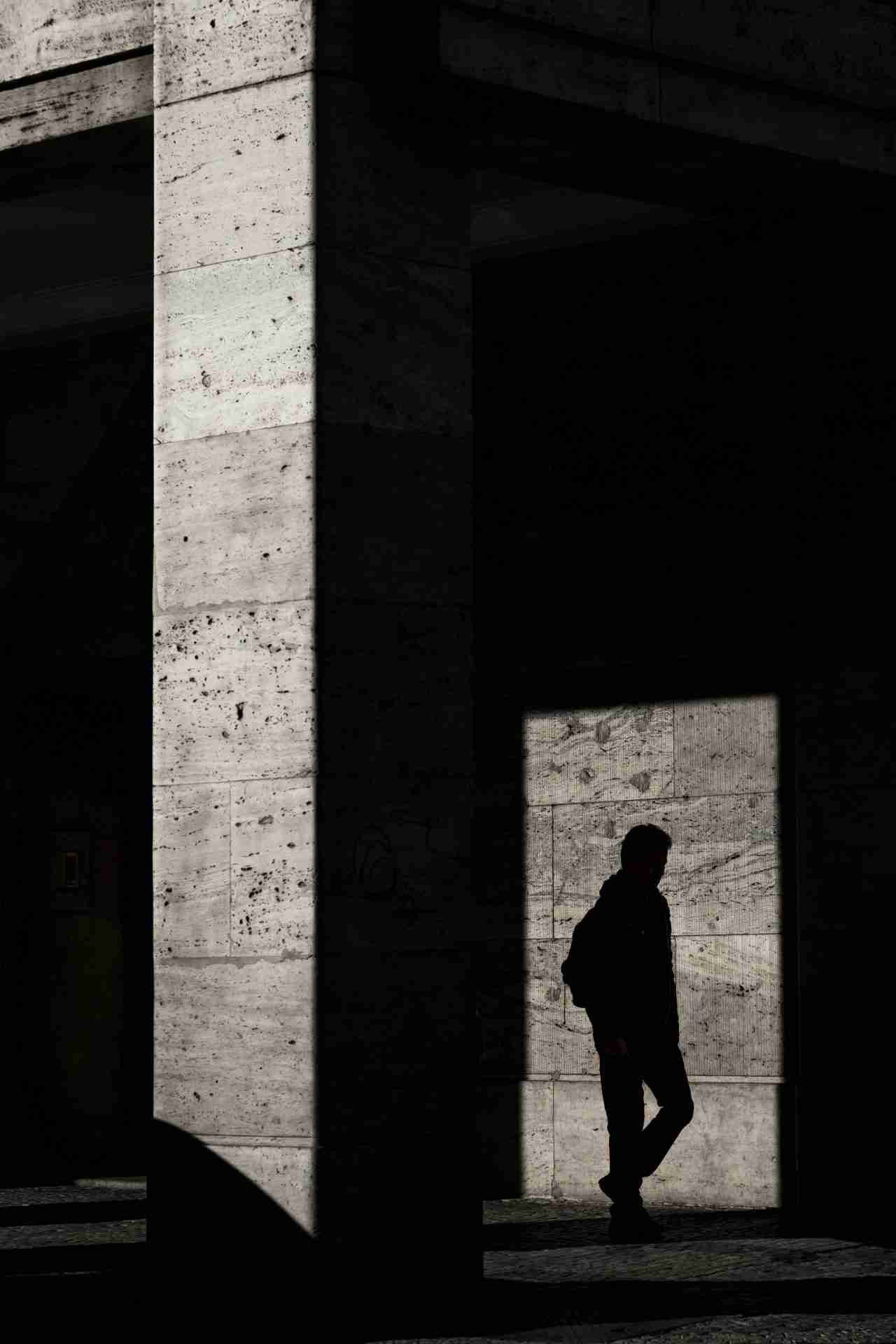 Abstract light and shadow reflection illustrating Jungian shadow work and depth therapy